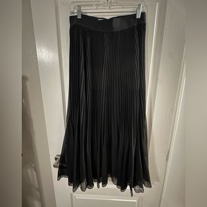 Wilfred
- Black Twirl Pleated Skirt